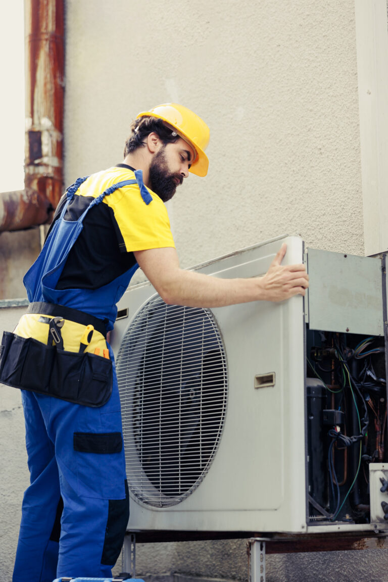 certified technician contracted fix broken air conditioner dismantling condenser front coil panel check faulty internal components electrician opening hvac system check improper wiring scaled.jpg